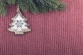 Christmas tree vintage background. Red wool fabric pale color Royalty Free Stock Photo
