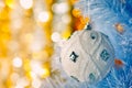 Christmas tree with white bauble