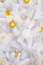Christmas tree, white with gold balls, close-up Royalty Free Stock Photo