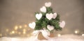 Christmas tree with white hearts