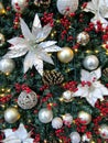 Christmas tree white, silver, golden and red decorations background closeup Royalty Free Stock Photo