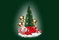 Christmas tree on white snow. Gift boxes, candy canes, balloons in form of golden stars, snow globe are nearby. Green Royalty Free Stock Photo