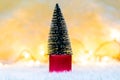 Christmas tree on white snow, light bokeh backgrounds ,Merry Christmas and happy New Year Royalty Free Stock Photo