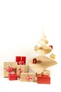 Christmas tree wood with holiday gift boxes decorated with ribbon isolated on white background. Royalty Free Stock Photo