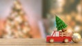 The Christmas tree in wood truck on wood table 3d rendering