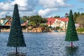 Christmas trees on lake and colorful buidlings and at Seaworld 3