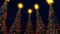 Christmas trees, light decorations with yellow stars on top in the night background Royalty Free Stock Photo