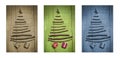 Christmas trees made of wooden branches with gifts. Triptych in brown, green and blue. Royalty Free Stock Photo