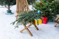 Christmas trees and spruce xmas branches for decoration in farm market for sale in winter holiday season Royalty Free Stock Photo