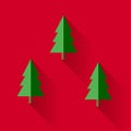 Christmas trees in vector flat design style. Fir tree icon isolated on red Royalty Free Stock Photo