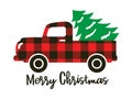 Buffalo Plaid Truck Carrying a Christmas Tree Royalty Free Stock Photo