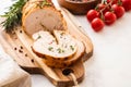 Christmas Turkey Breast Roll Stuffed with Cheese, Cranberries and Herbs, copy space. Royalty Free Stock Photo