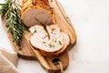 Christmas Turkey Breast Roll Stuffed with Cheese, Cranberries and Herbs, copy space. Royalty Free Stock Photo