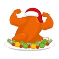 Christmas turkey strong in Santa red cap. Fitness food for New Y