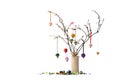 Christmas twig tree decoration. Bells and baubles. White background.