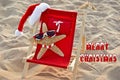 Christmas starfish in red beach chair Royalty Free Stock Photo