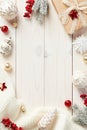 Christmas vertical wooden background with Xmas decorations, gift box, fir branches. Flat lay, top view, copy space Royalty Free Stock Photo