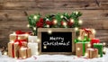 Christmas vintage decoration burning candles gift boxes lights Royalty Free Stock Photo