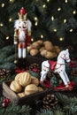 Christmas Walnuts cookies and toys on wooden background