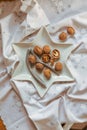 Christmas walnuts plate with nutcracker Royalty Free Stock Photo