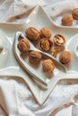 Christmas walnuts plate with nutcracker Royalty Free Stock Photo