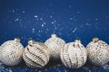 Christmas white balls on a blue background. Royalty Free Stock Photo