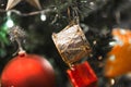 Christmas white silver drum hanging on a beautiful Chrismas tree surrounded by red shinning ball Royalty Free Stock Photo