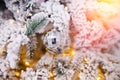 Christmas white tree decorated snow illumination and gifts toys, background sun light bokeh Royalty Free Stock Photo