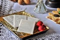 Christmas white wafer on table. Oplatek