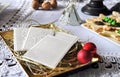 Christmas white wafer on white tablecloth. Oplatek