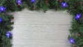 Christmas white wooden background with purple star lights and other blinking lights