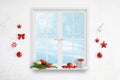 Christmas window decorations Winter time with a lot of snow visible through the window Royalty Free Stock Photo