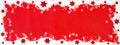 Christmas / winter background banner panorama template - Frame made of snow with snowflakes, stars and bokeh lights on red colored Royalty Free Stock Photo