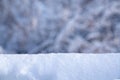 Christmas winter background with snow and blurred bokeh