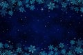 Blue Christmas winter background with frame of snowflakes Royalty Free Stock Photo