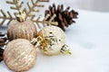 Christmas of winter - Christmas balls with ribbon on snow, Winter holidays concept. Christmas red balls, golden balls, pine And S