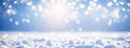 Christmas Winter banner background. Winter snow background with snowdrifts, with beautiful light and snow flakes on the blue sky, Royalty Free Stock Photo