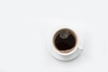 Christmas and winter concept. White cup of hot black coffee on white background. Top view. Royalty Free Stock Photo