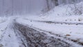 Christmas winter landscape spruce and pine trees covered in snow on a mountain road