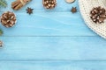 Christmas, winter,new year,Xmas - top view background. Rustic blue wooden planks with anise star, pine cones and knitted