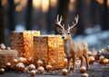 Christmas winter still life with gift box, gold figurine of deer, decorative Christmas tree, burning candles and festive