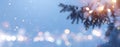 Christmas winter tree and holidays garland lights. Abstract blurred Christmas background. Widescreen backdrop. New year Winter art