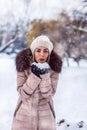 Christmas Winter Woman blowing Magic snow in Her Hand. Fairy. Be Royalty Free Stock Photo