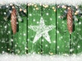Christmas or winter wooden background with snowy fir branches and snow flakes