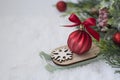 Christmas winter wooden sleigh with red bauble over the snow. Abstract winter greeting card with copy space. Royalty Free Stock Photo