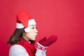 Christmas woman Blowing the Snow Royalty Free Stock Photo