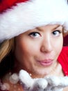 Christmas woman blowing starlight dust Royalty Free Stock Photo