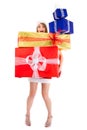 Christmas woman carrying gift pile