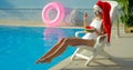 Christmas Woman eating watermelon at the Pool Royalty Free Stock Photo