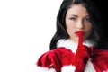 Christmas woman with finger on lips